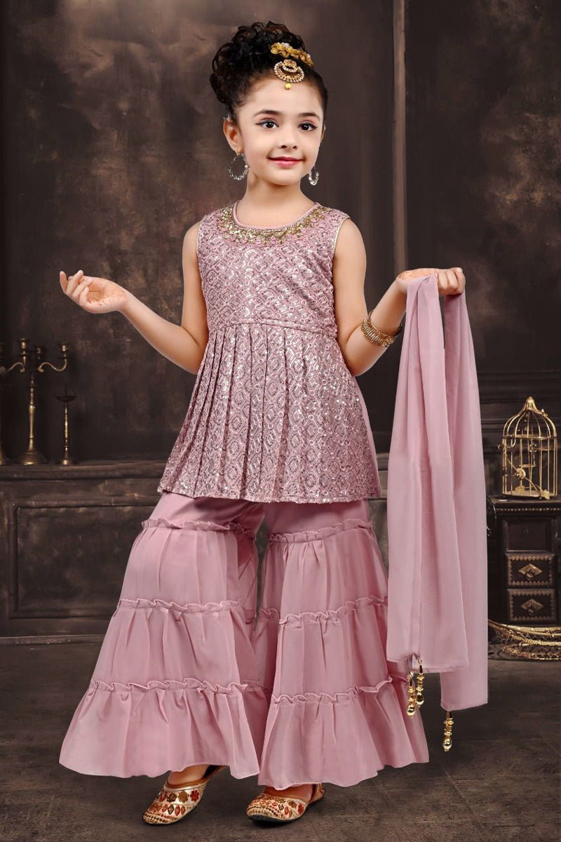 Baby pink colored semi-stitched sharara suit